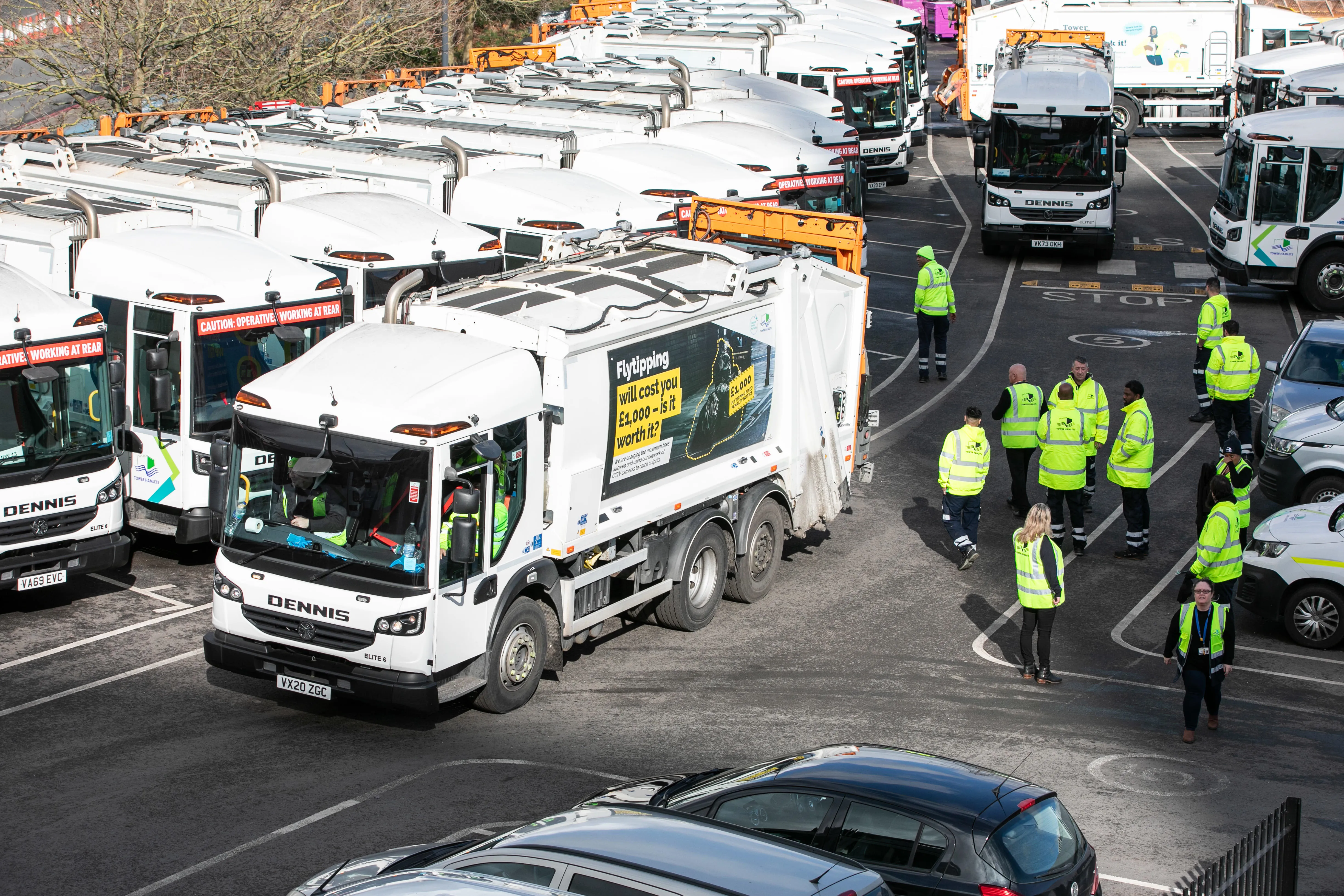Waste collection vehicle leaving the depot.